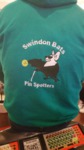 The Swindon Bats Logo on a pin spotter's shirt
